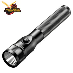 Black tactical flashlight with ribbed grip and side power button; NTOA member tested and recommended logo in the corner.