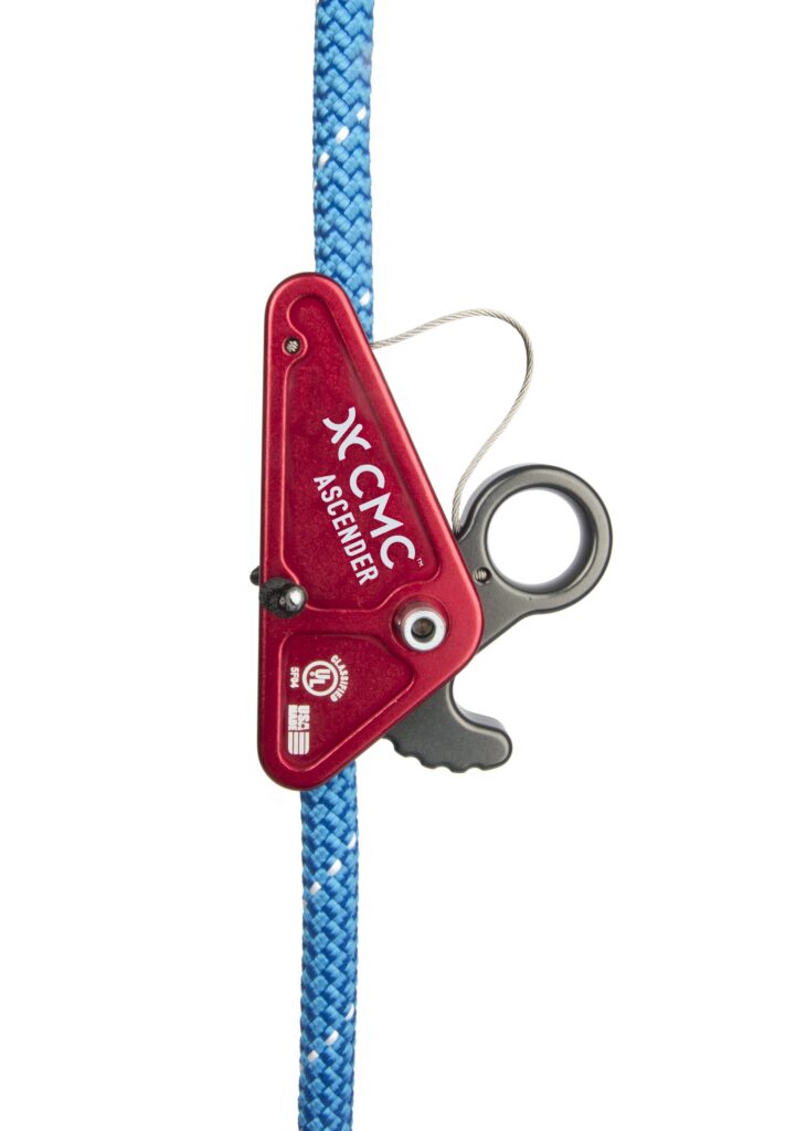 Red CMC Ascender clipped to a blue climbing rope, used for rope ascents in climbing.**Note: concise and descriptive.**