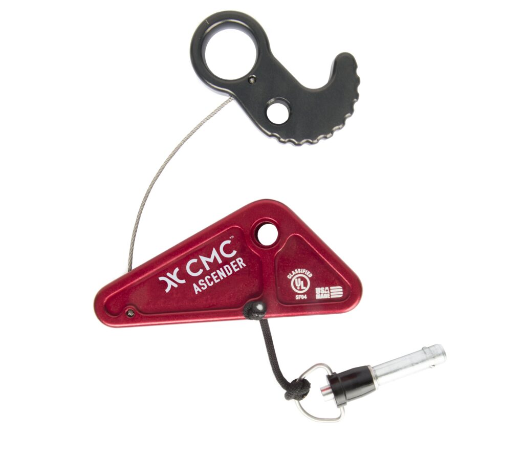 Red CMC Ascender rope-climbing device with metal cam and attached lanyard for ascending a rope. Includes a detachable grip/pulley piece on a wire rope.