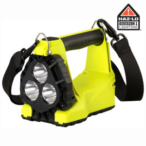 Bright yellow rugged handheld LED flashlight with three circular bulbs and a black front housing, strap attached, Haz-Lo Division 1 Lighting logo in corner.