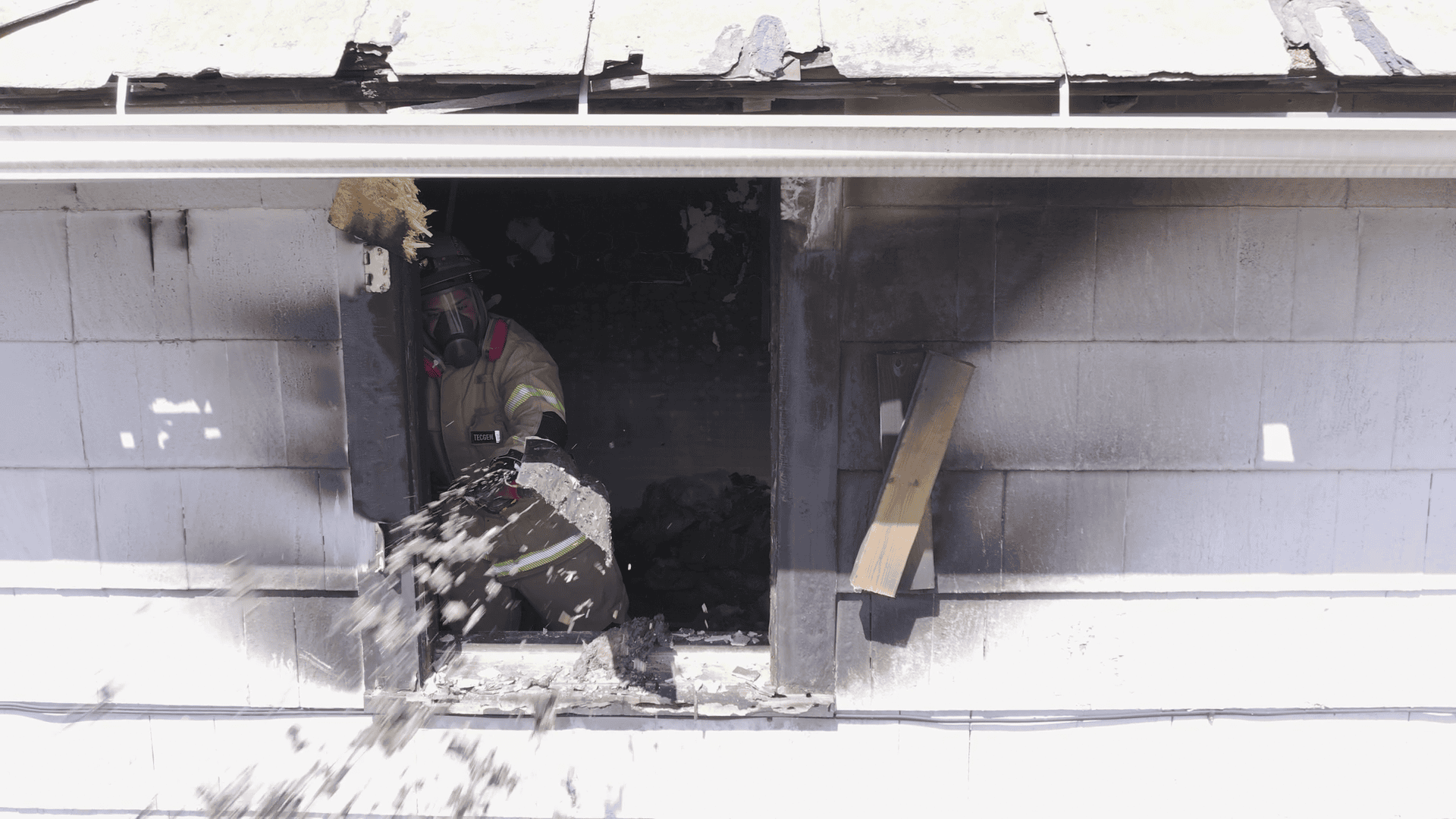 Fire-Dex investigation gear in action with respiration mask