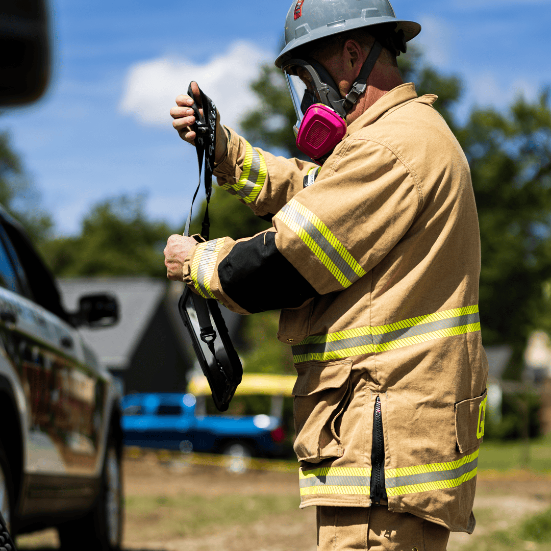 Fire-Dex investigation gear in action with respiration mask